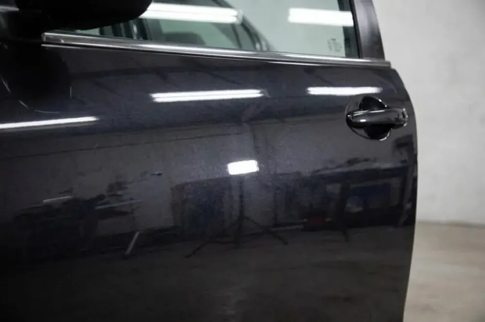 Paint correction removing swirl marks on car paint