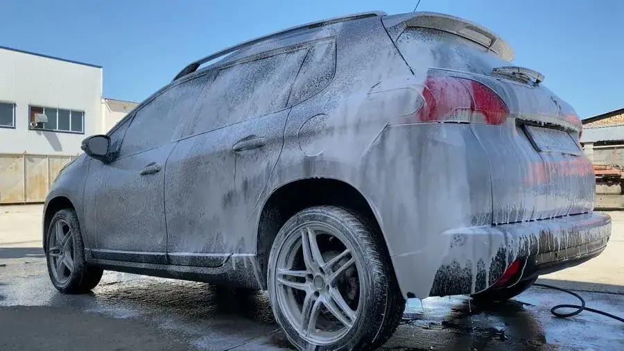 Car covered in foam — detailing in Denver