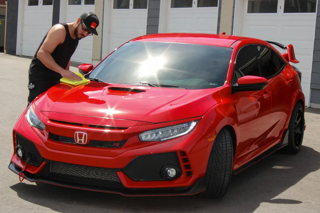 Mobile exterior detailing on a car